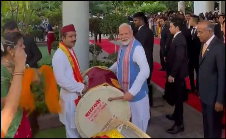 Video: PM Modi Shows Off His Dhol Skills In Singapore