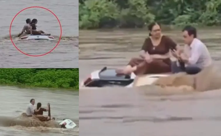 Couple Rescued In Flood Water At Gujrat Video Viral