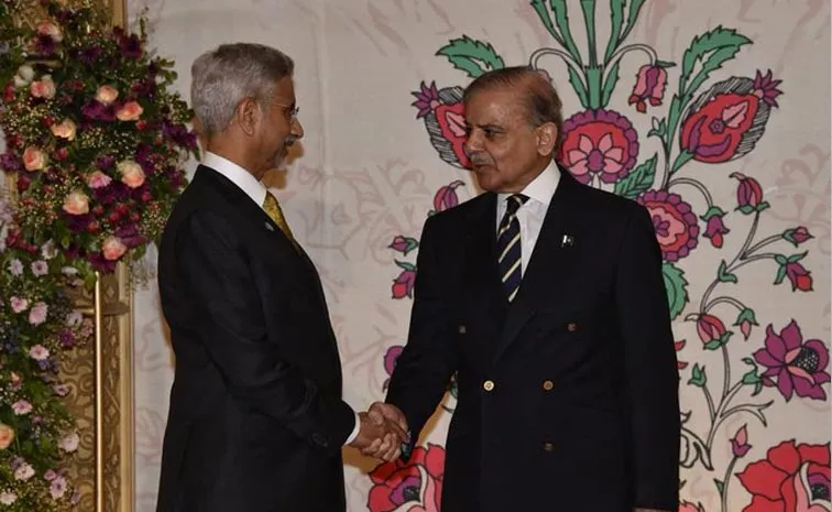 S Jaishankar Shehbaz Sharif shake hands in Pakistan