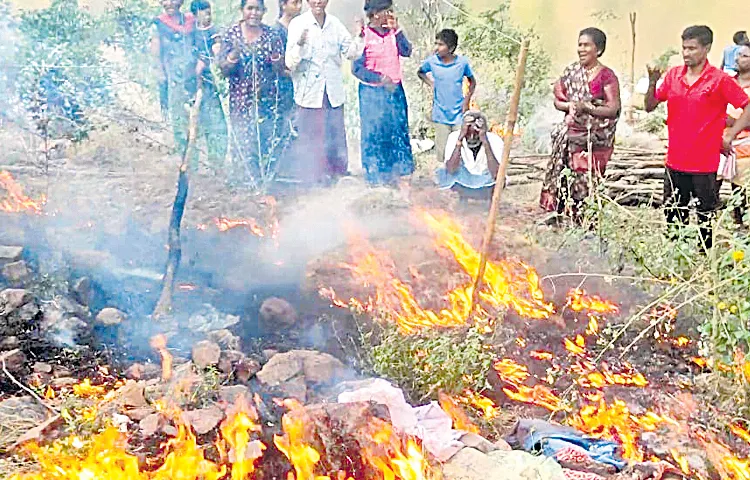 Forest officials destroy fishermens nets on fire