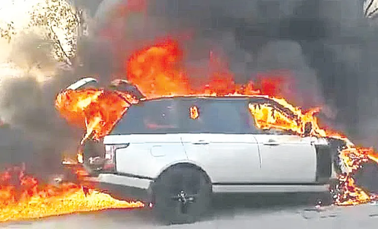  Fire Broke out In Car Near Narketpally Nalgonda