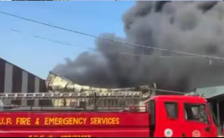 Noida news fire in building in sector 18