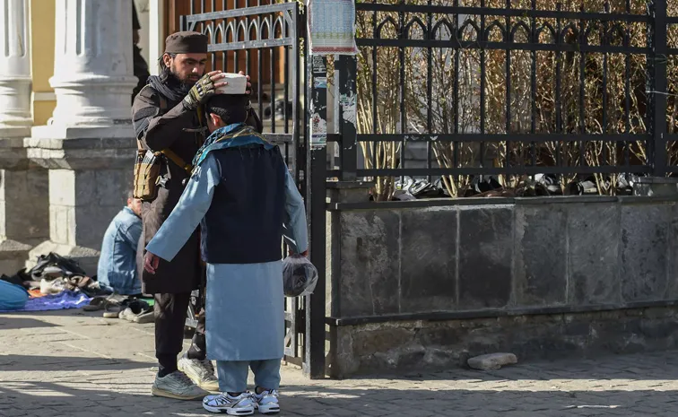 Taliban morality enforcers arrest men for having the wrong Hair Style