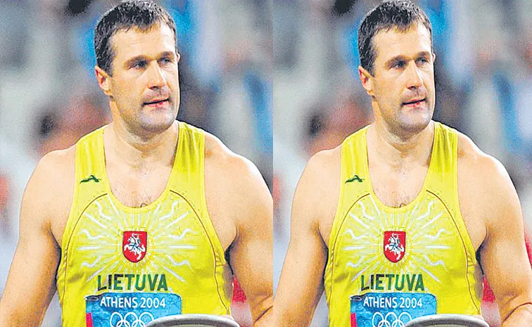 Mykolas Alekna Breaks Mens Discus World Record