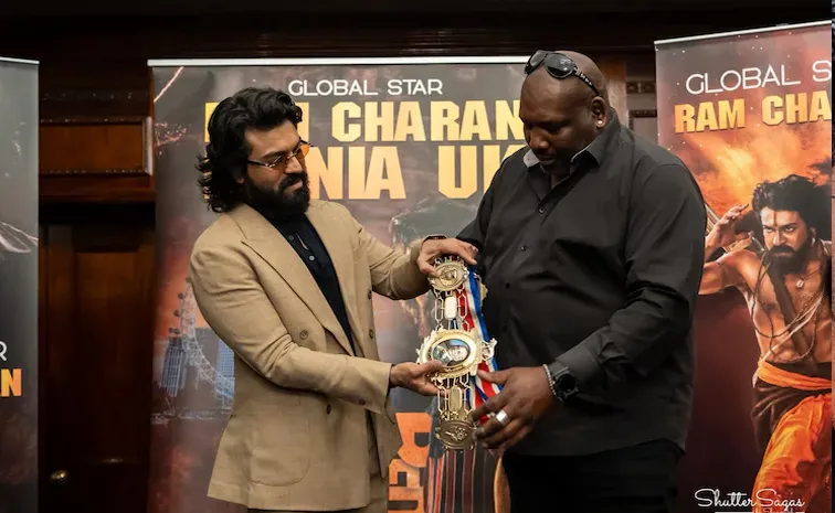 Ram Charan meets ex boxing champion Julius Francis at London