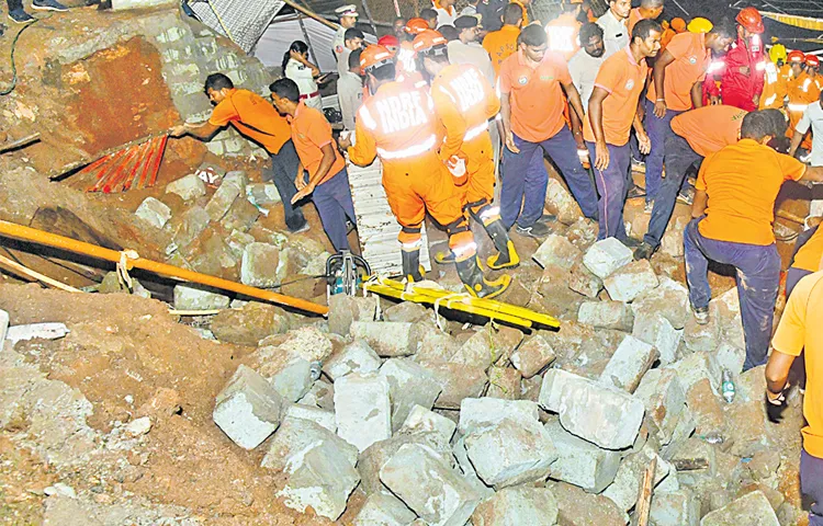 Endowment Department Commissioner submits report to govt on collapsed wall in Simhagiri1
