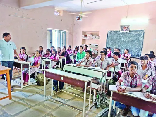 తొమ్మిదేళ్లుగా శతశాతం ఉత్తీర్ణత