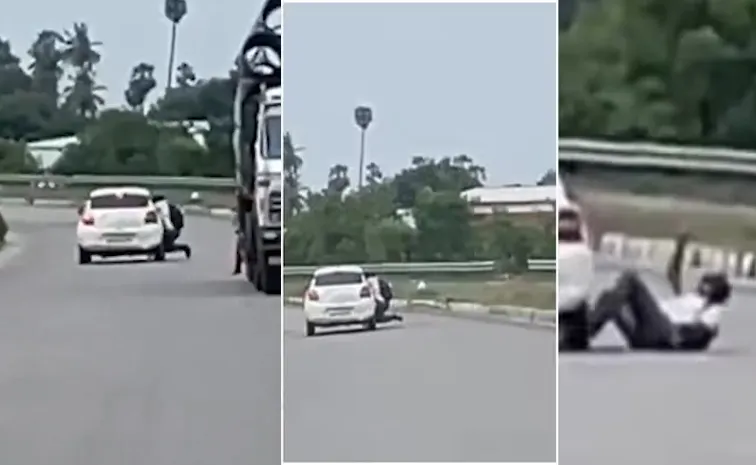 Tiruvallur SI Ananda Kumar hangs on Speeding car Video Viral3