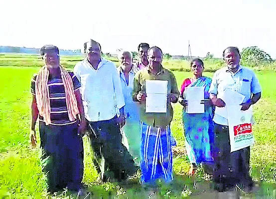 దళితుల భూములపై టీడీపీ నేత కన్ను