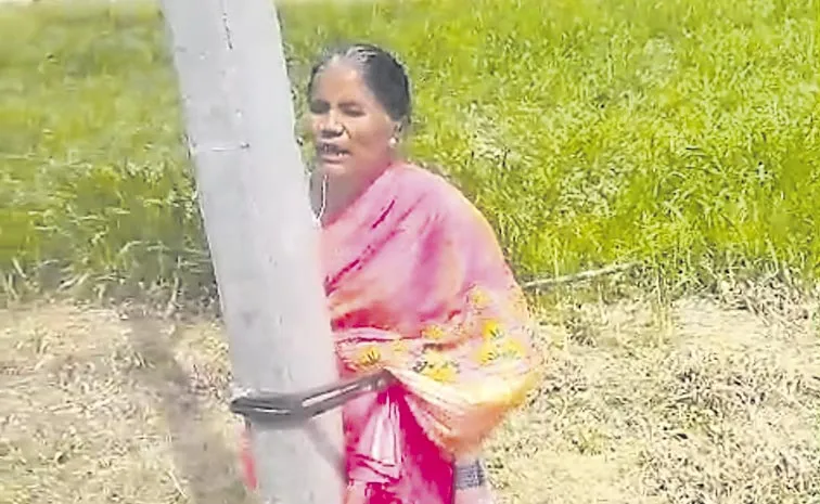 Woman tied to Electric pole: Andhra pradesh