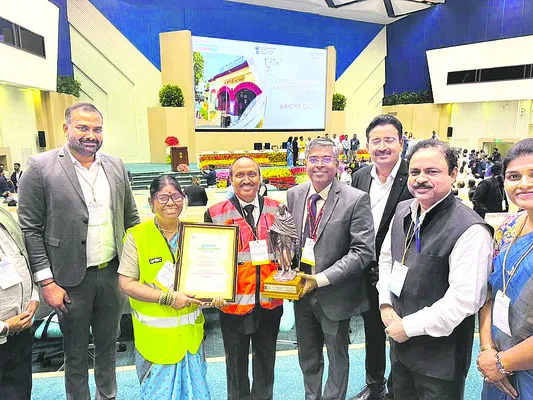  Ilambarthi Karnan and others after receiving the award