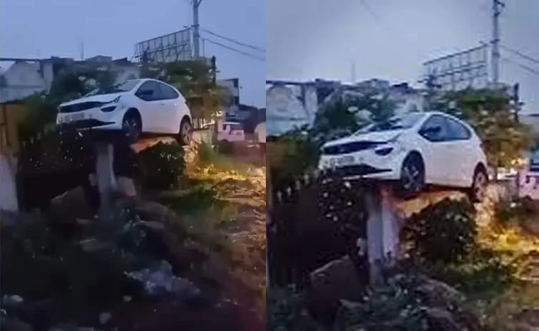 car Climb On Wall In Accident At Dundigal