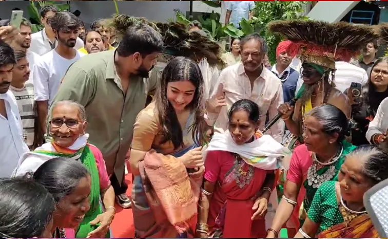 Rashmika Mandanna Face With Tribal Woman At Mysaa Movie Opening Ceremony