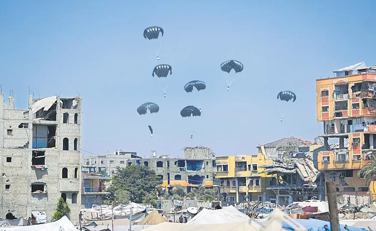 Palestinians wary as Israel begins military pauses to allow minimal aid into Gaza