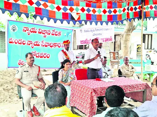 మెగా లోక్ అదాలత్లో 1076 కేసుల పరిష్కారం