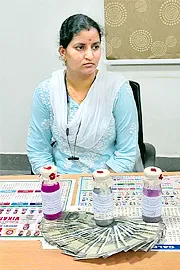 Women Employee at Vikarabad Collector office Caught taking bribe7