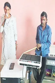 Specially abled couple success as orchestra singers8