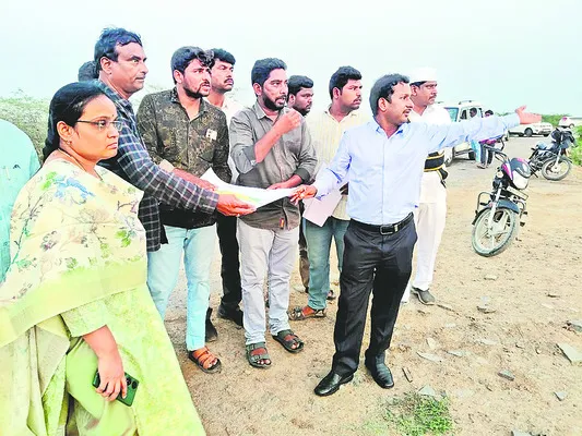భూములపై కన్నేసి!