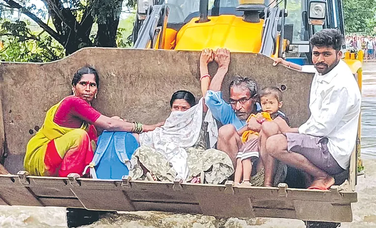 Pregnant Woman Rescued via JCB in Flooded Villag