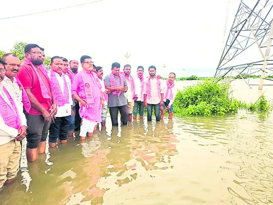 ‘గేట్లు ఎత్తినా పంట పొలాలు మునిగాయ్’