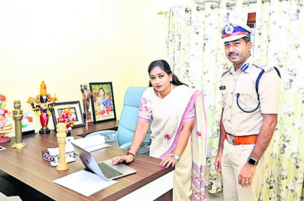Home Minister Anitha and Regional Fire Officer Niranjan Reddy launching the portal