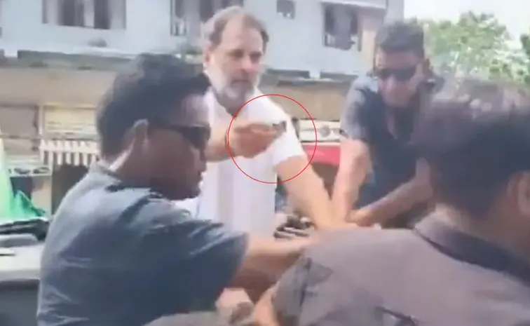 Sweet Response Rahul Offers Candies to Protesters