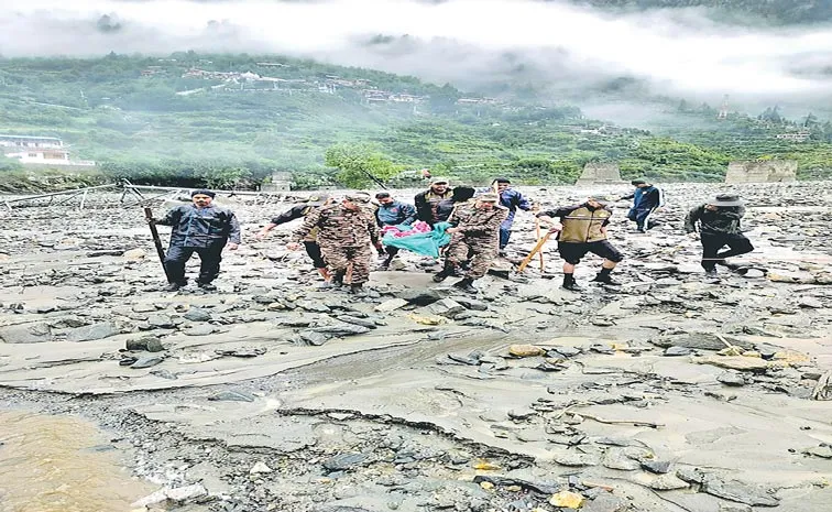 Rescuers search for the missing in flood-hit Dharali