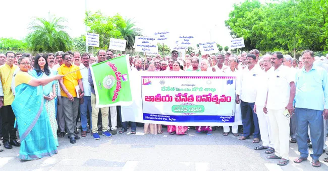 Collector Haimavati flagging off the handloom rally
