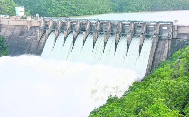 శ్రీశైలంలో పది గేట్లు ఎత్తివేత