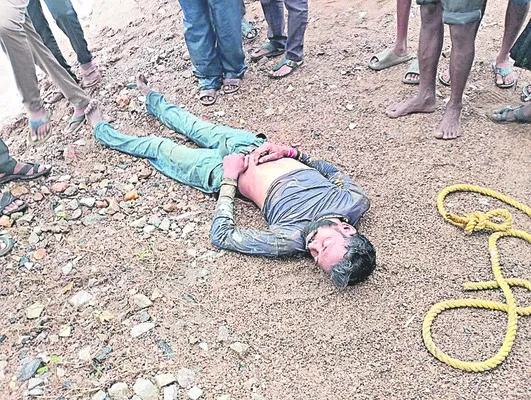 వంతెనపై నుంచి పడి కూలీ మృతి 