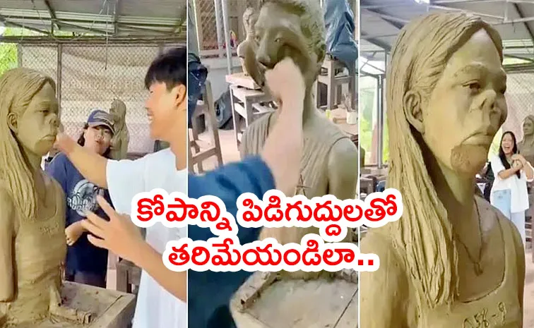 Thailand artists create stress relief sculpture to smack