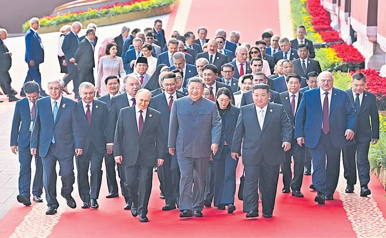 China unveils latest weapons in military parade