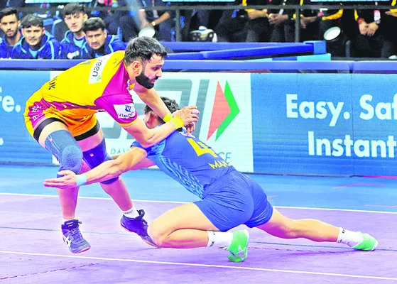 ఉత్కంఠ పోరు.. టైటాన్స్‌ జోరు