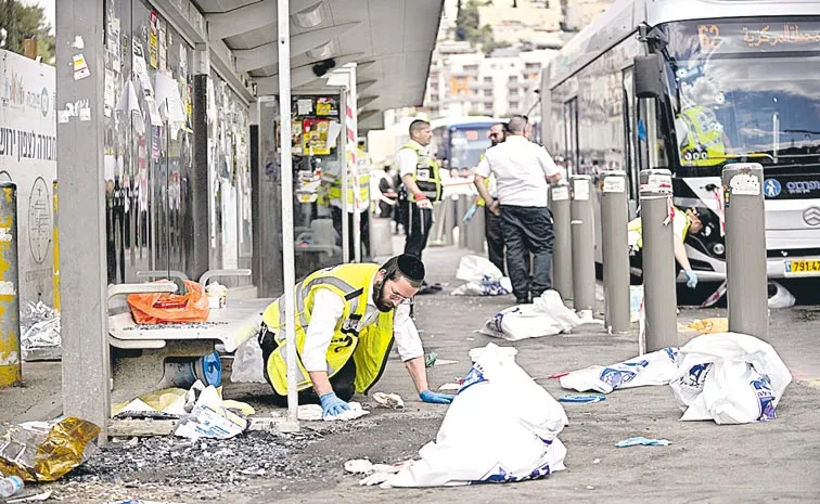 Six killed by Palestinian gunmen at Jerusalem bus stop