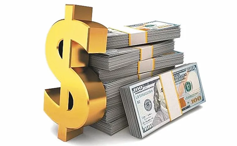 Indias forex reserves dip below USD 700 billion