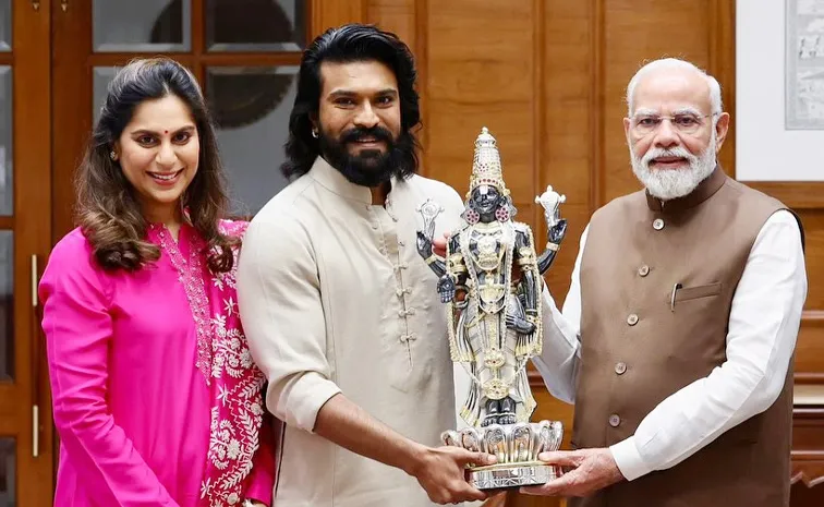 ప్రధాని మోదీని కలిసిన చరణ్-ఉపాసన.. కారణం ఏంటంటే?