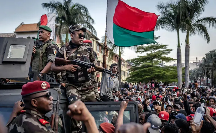 Madagascar president warns of attempted coup after soldiers join protests