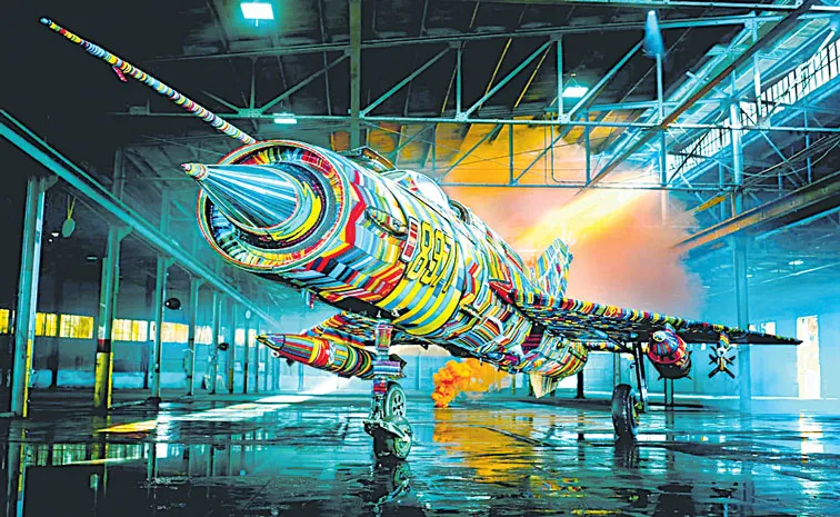 South African artist Ralph Ziman revives a reclaimed MiG-21 fighter jet by covering beads