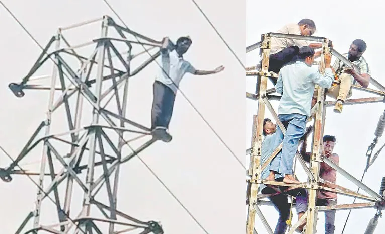 Drunk man climbs electricity tower