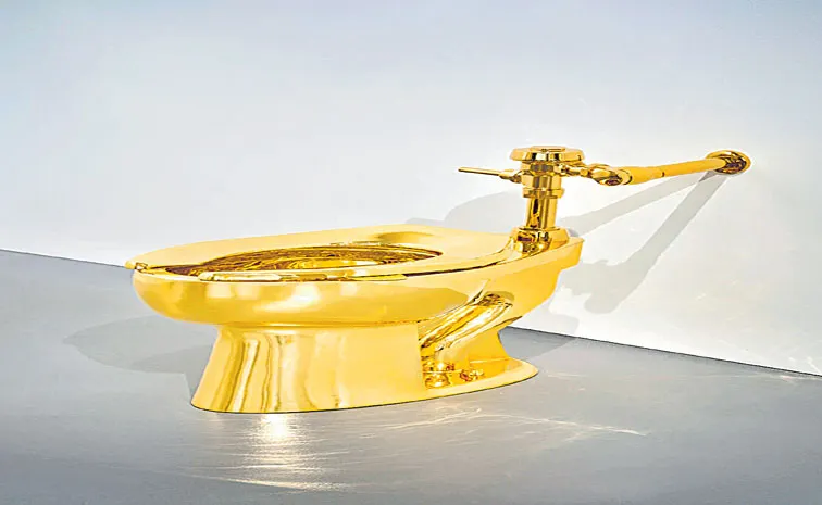 A solid gold toilet called America is up for auction
