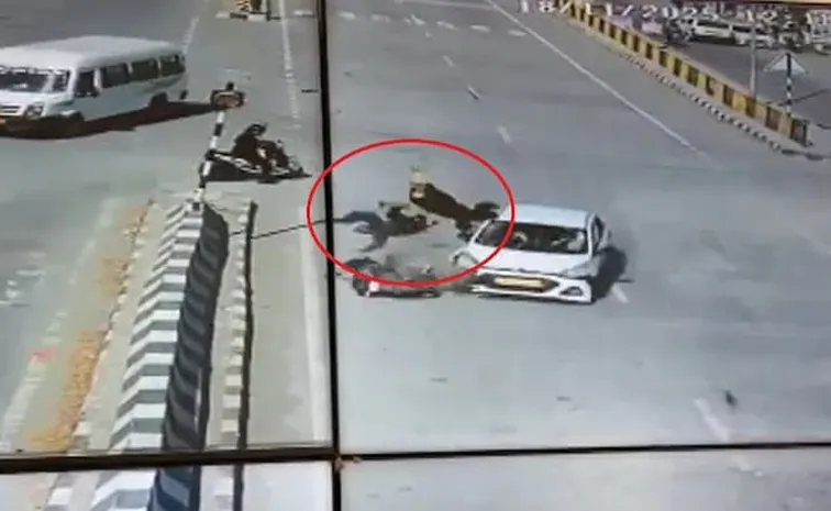 Bikers Jump into air after collision with speeding car At Uttarakhand