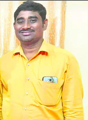 బస్సు టైర్‌ కింద పడి ప్రయాణికుడి మృతి