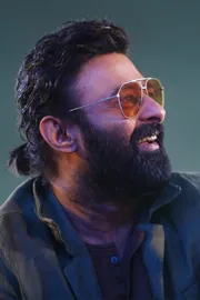 Prabhas comments about his directors in The Raja Saab event5