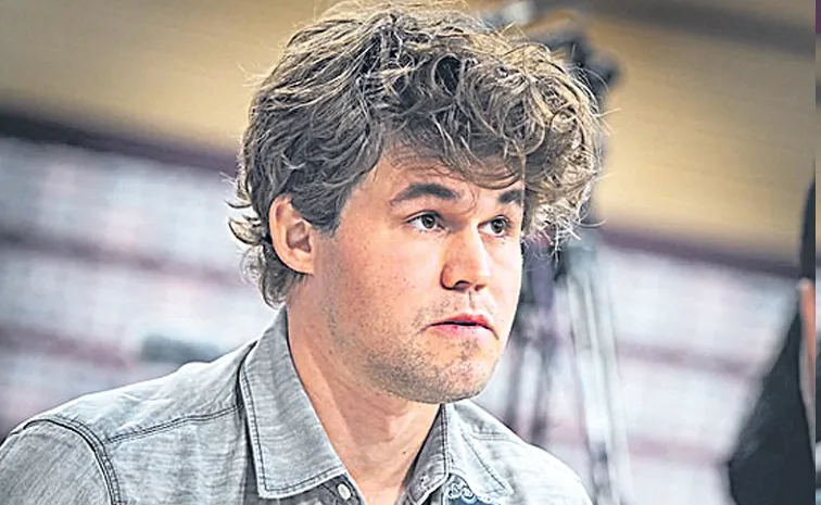 Magnus Carlsen becomes world champion for the 20th time2