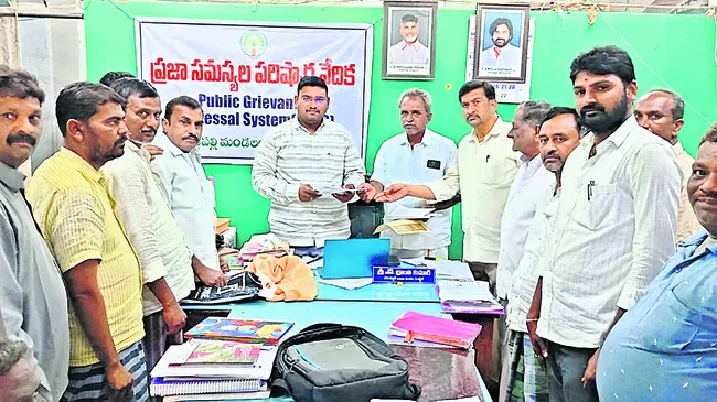 అక్రమార్కుల నుంచి మా భూములు కాపాడండి