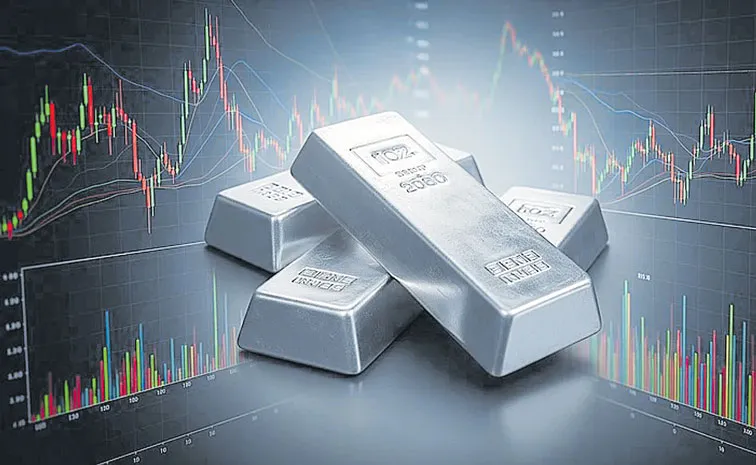 Gold, silver futures drop as investors book profits