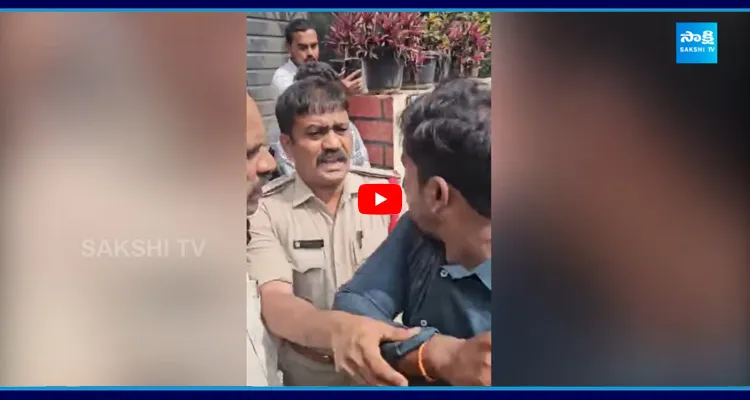 సాక్షి ఫోటోగ్రాఫర్‌పై పోలీసుల దాడి