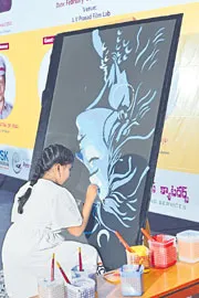 Pravya Aditri painting of Lord Shiva in 12-44 minutes Viswaguru World Record