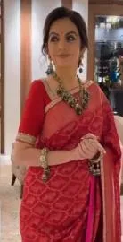 Fashion Tips: Nita Ambanis Red Banarasi Saree Features A Symbolic 