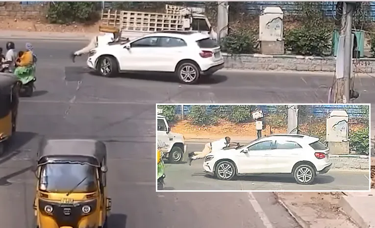 Drunk Driver Drags Traffic Constable On Car Bonnet at Gachibowli